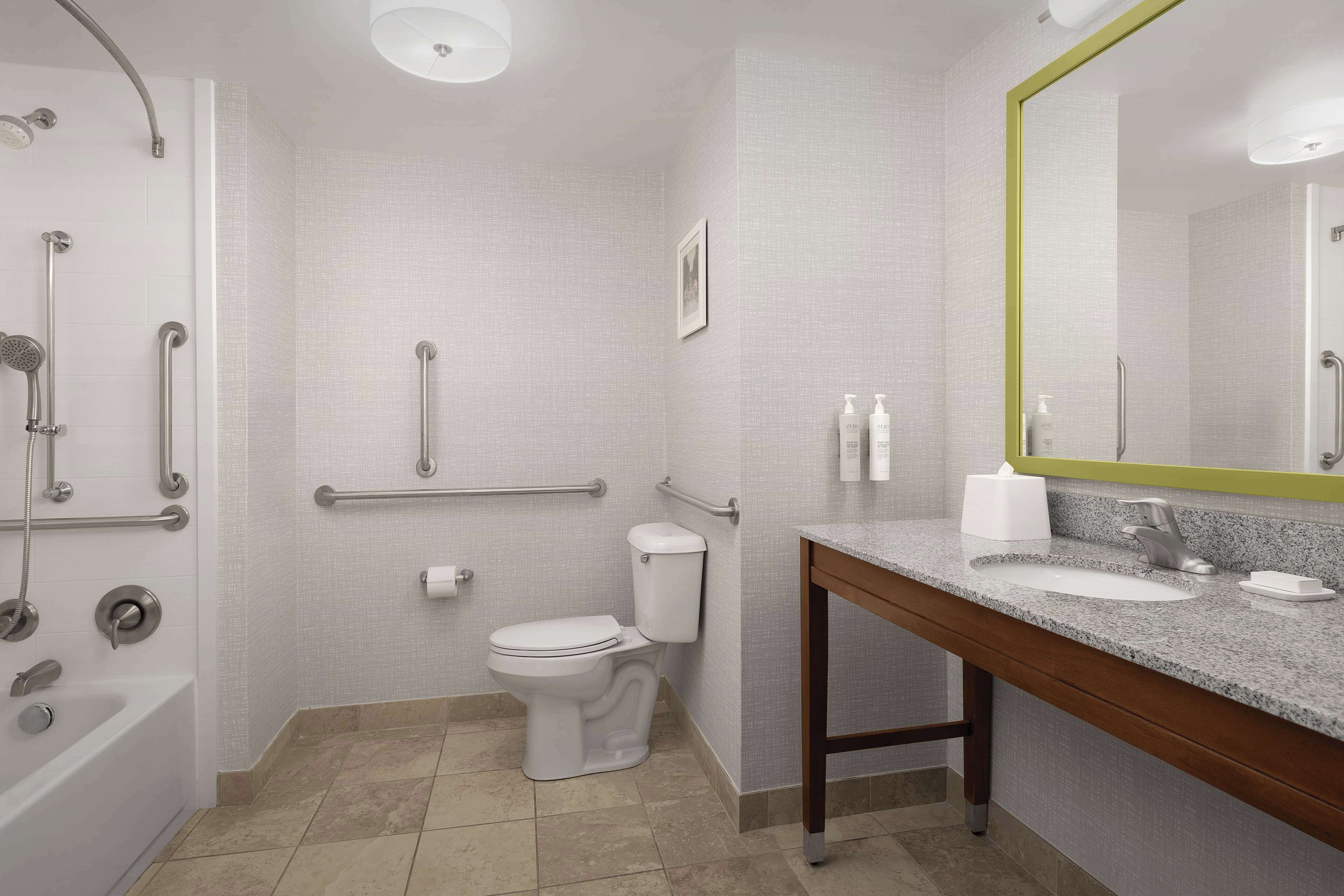 combined shower/bathtub, free toiletries, towels