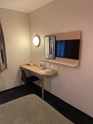 Desk, laptop workspace, blackout drapes, free WiFi