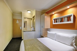 Desk, laptop workspace, blackout curtains, free WiFi
