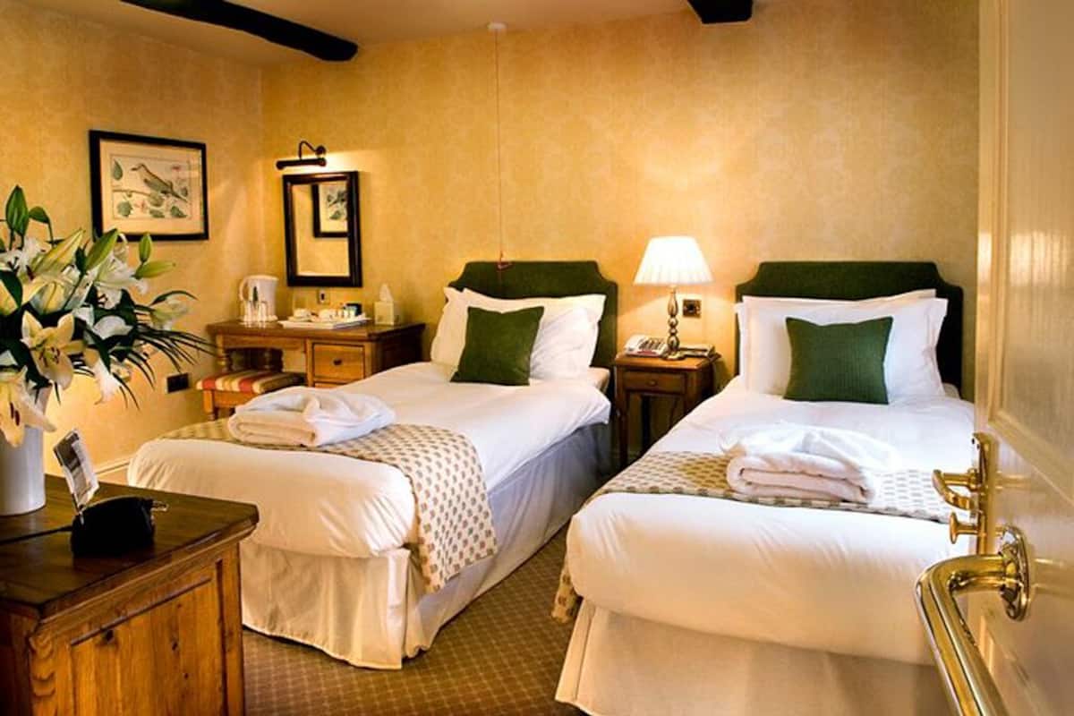 Twin Room | Premium bedding, desk, blackout drapes, iron/ironing board