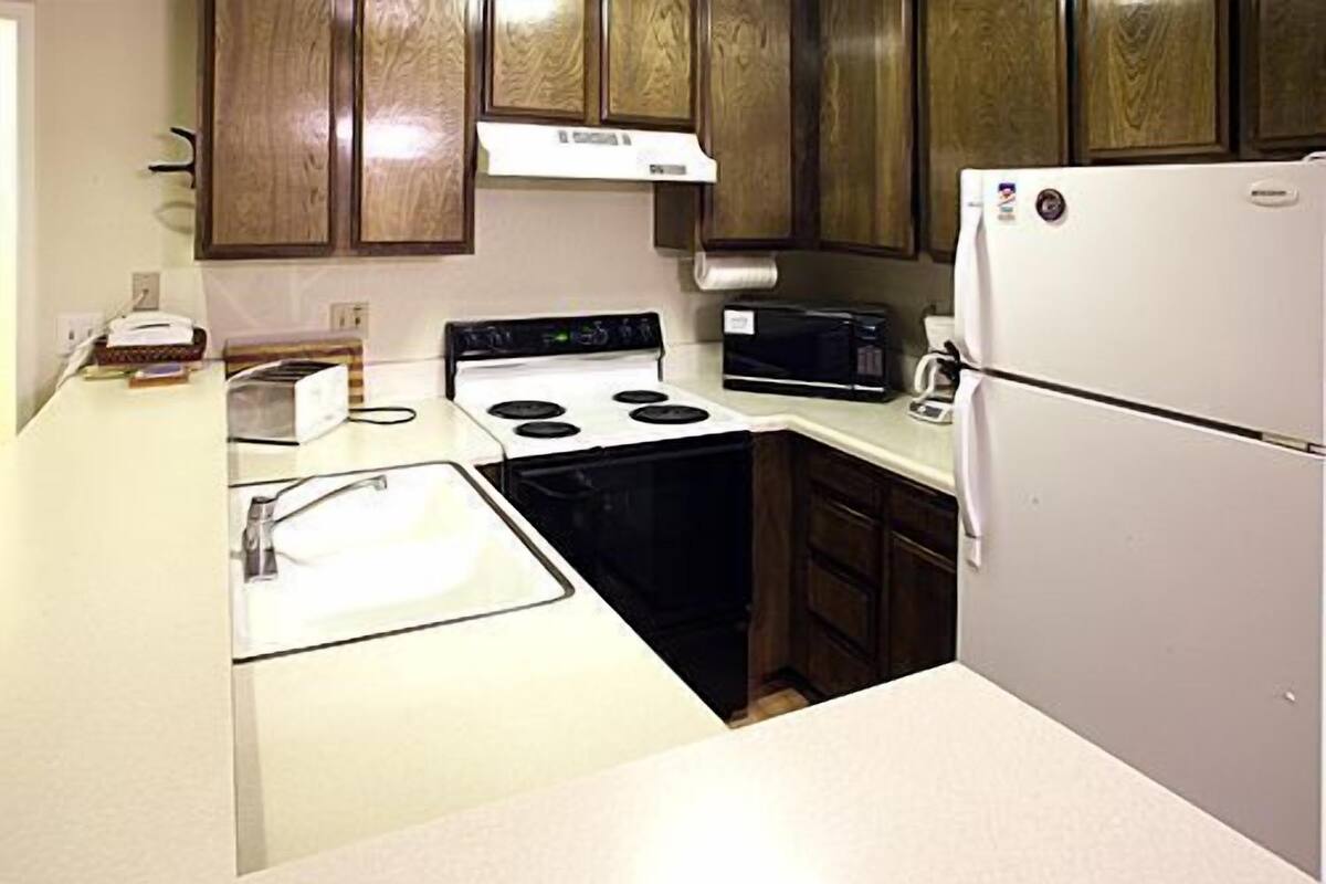 Condo, 1 Bedroom | Private kitchen | Coffee/tea maker, full-size fridge, microwave, stovetop