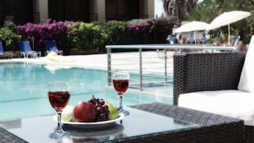 Seasonal outdoor pool, pool loungers