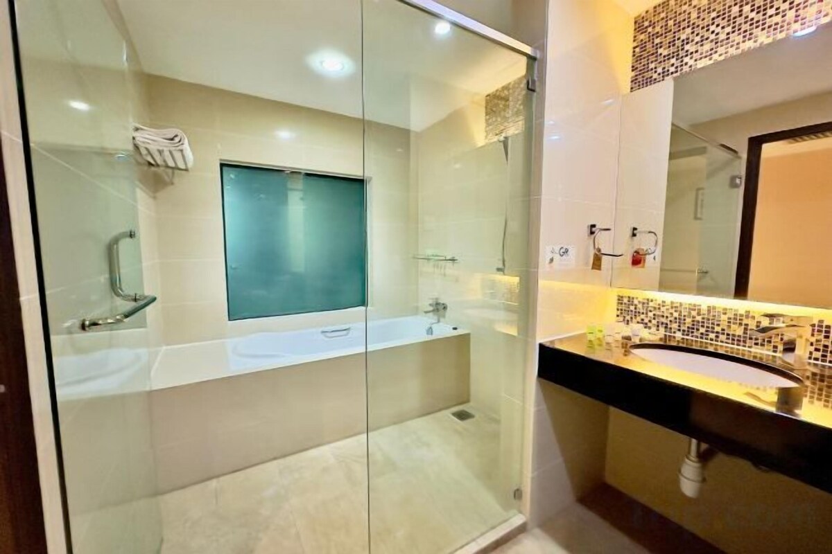 Bathroom | Bathtub, slippers, towels