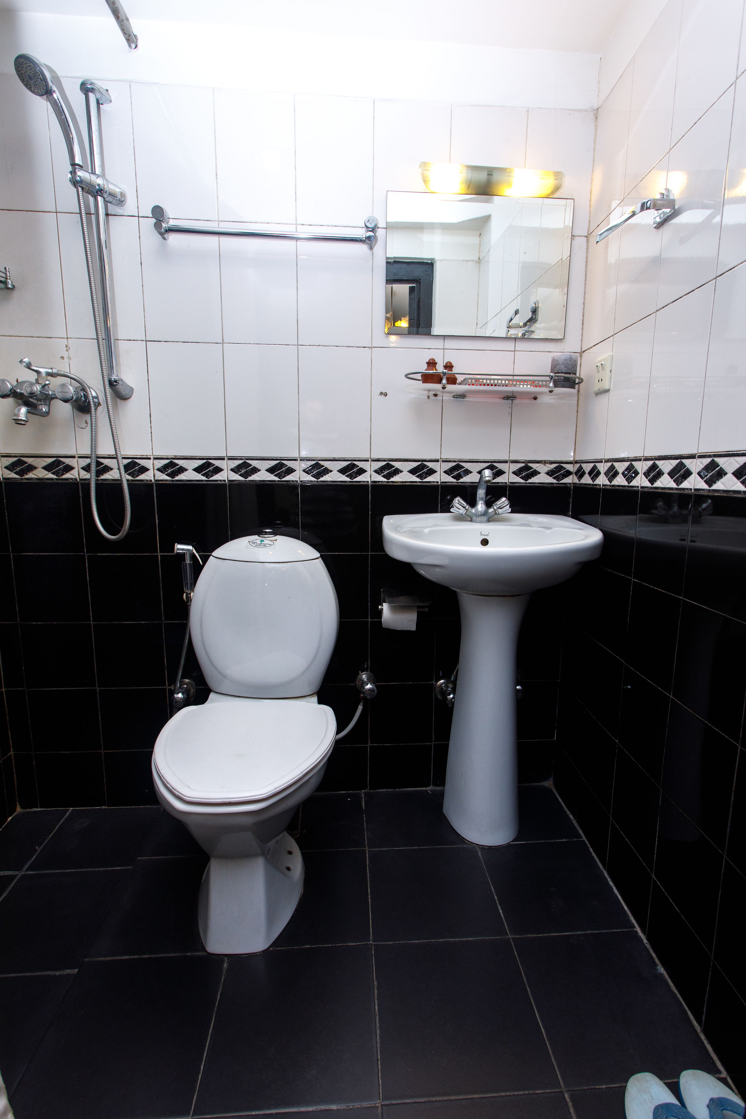 deluxe room | bathroom | shower, free toiletries, hair dryer, bathrobes