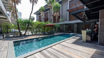 Outdoor pool, pool umbrellas, pool loungers