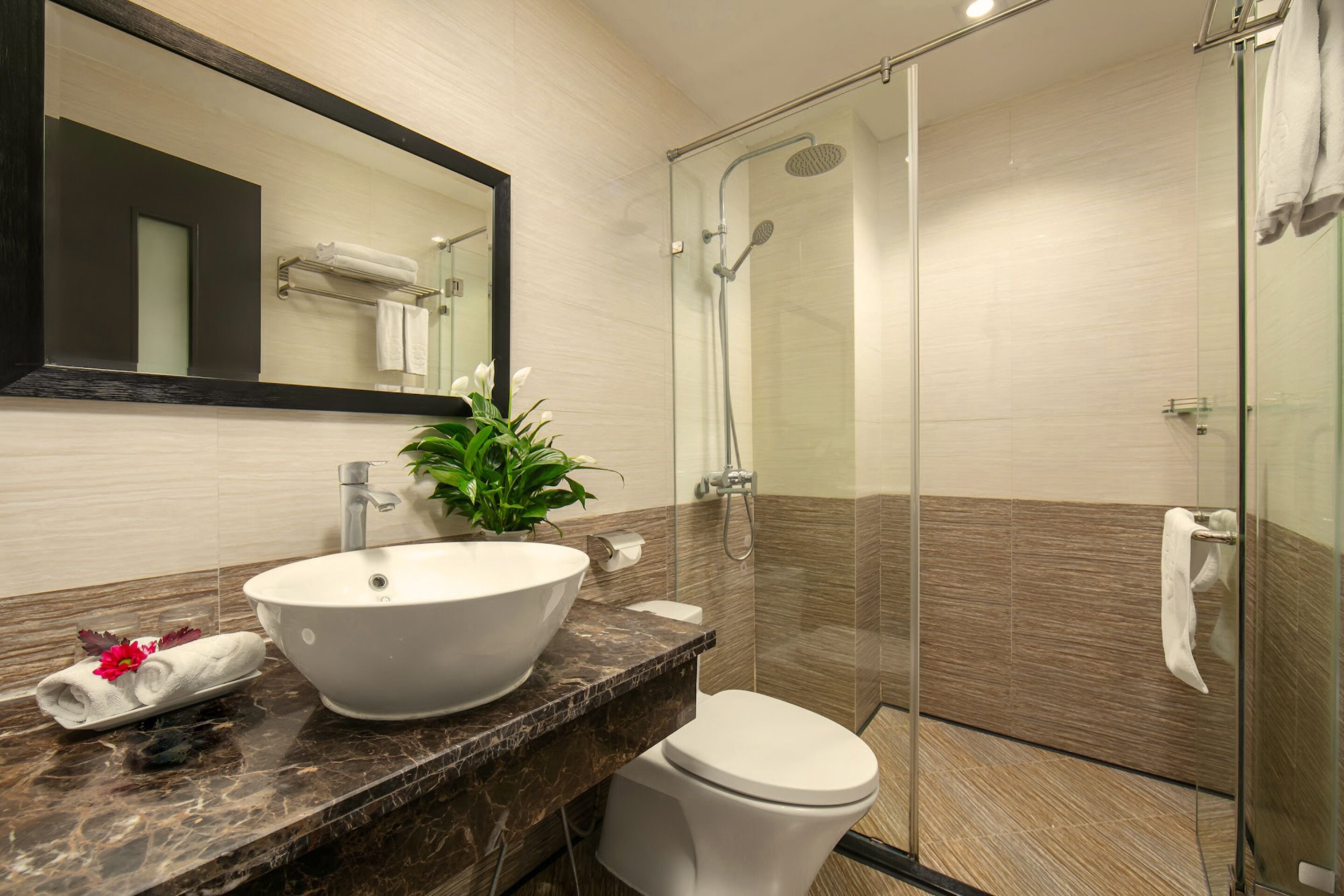 shower, rainfall showerhead, designer toiletries, hair dryer