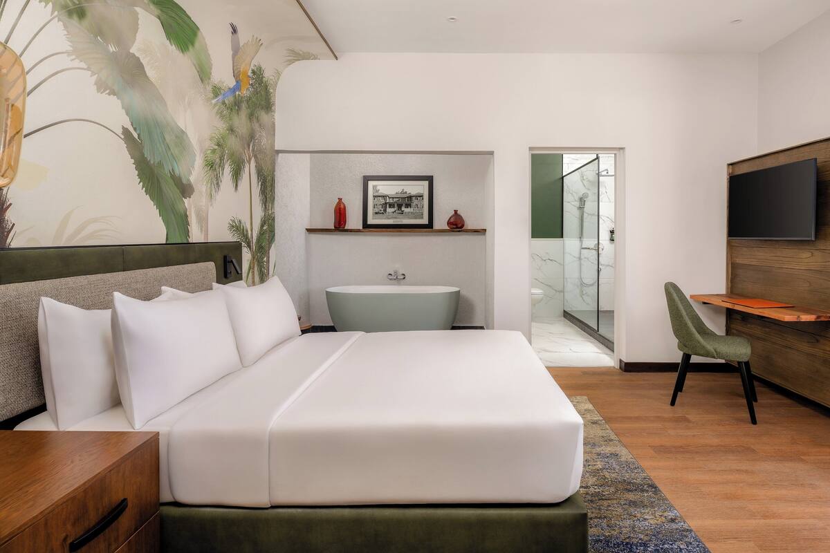 family suite, garden view | 1 bedroom, premium bedding, in-room safe, individually decorated