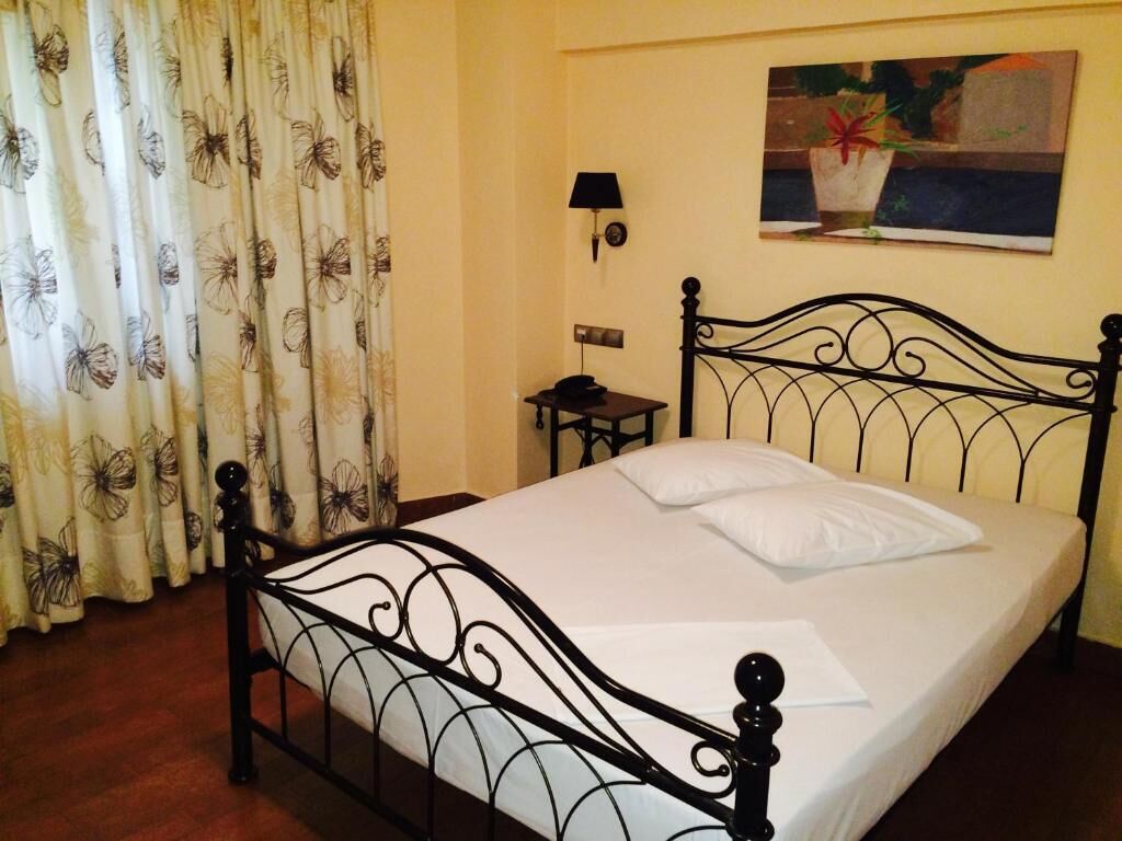 Economy Double Room Semi-Basement | Hypo-allergenic bedding, in-room safe, soundproofing, iron/ironing board