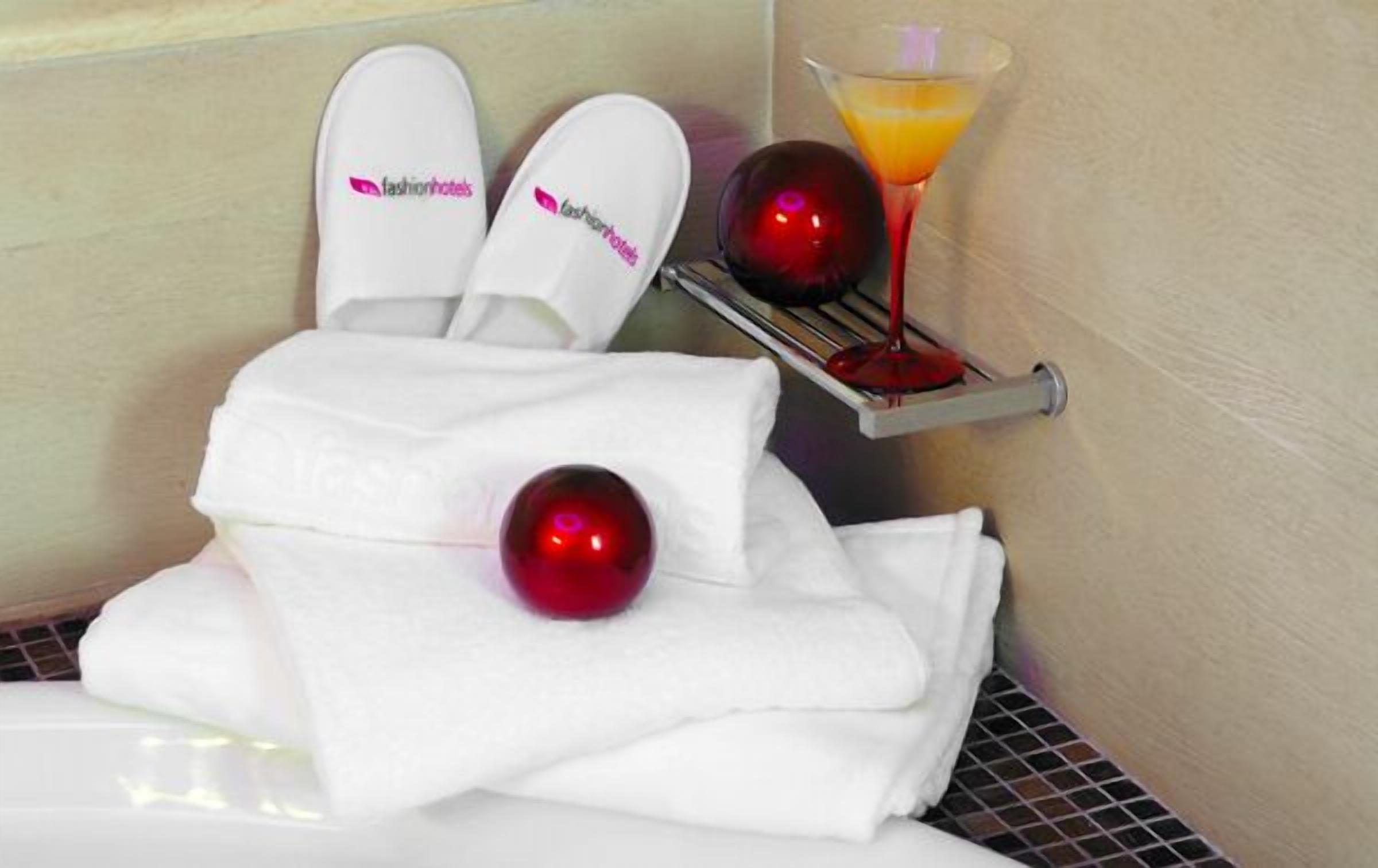 xxxsuite | bathroom amenities | designer toiletries, hair dryer, slippers, towels