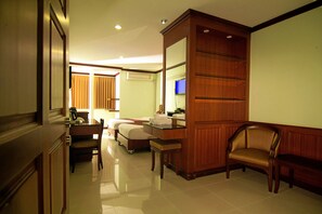 Superior Room | Living area | 29-inch LCD TV with cable channels, TV - Sky Suites (Bangkok)