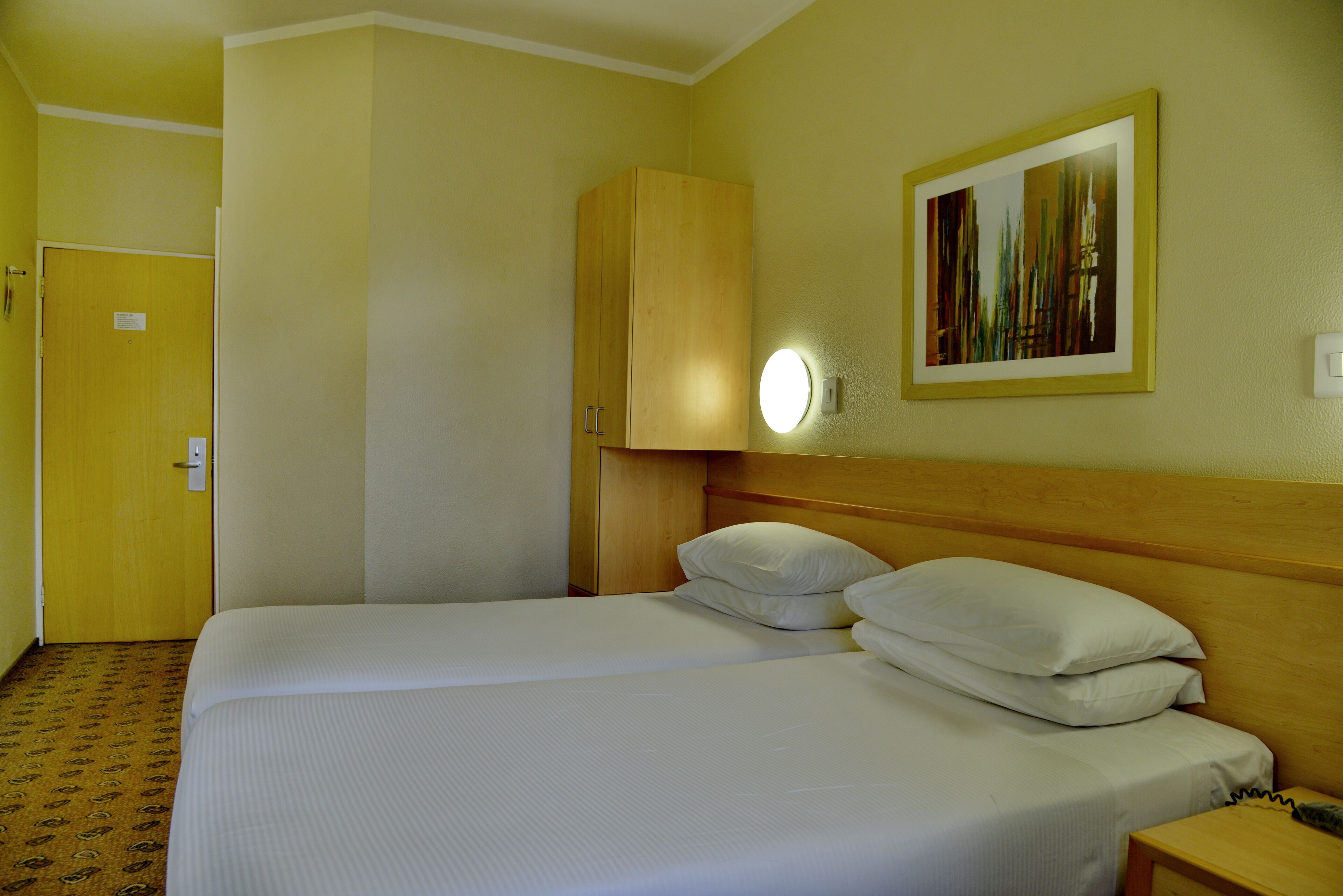 desk, laptop workspace, blackout curtains, iron/ironing board