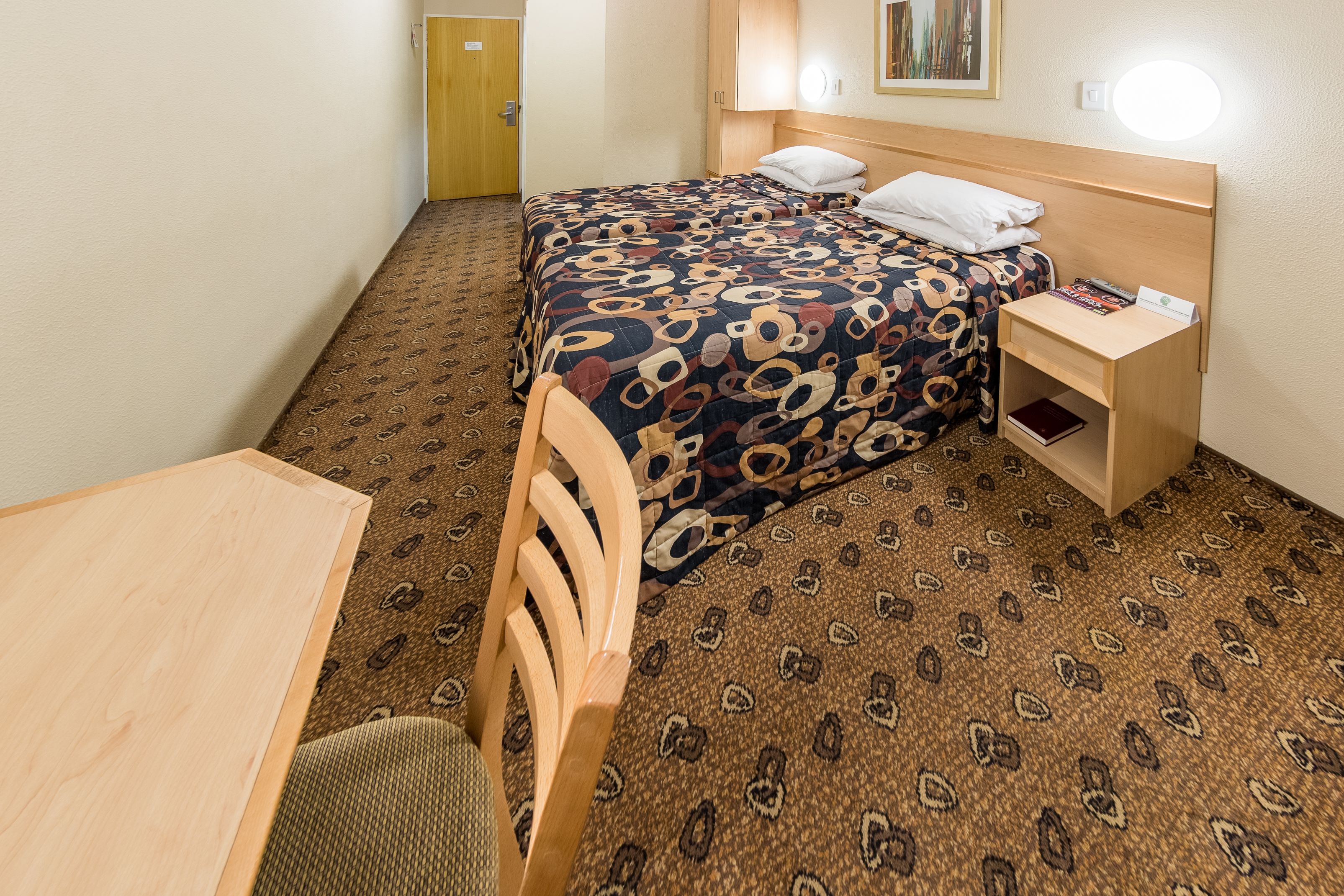 desk, laptop workspace, blackout curtains, iron/ironing board