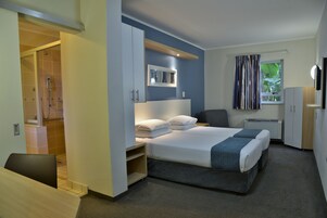 Twin Room, Accessible, Non Smoking | Desk, laptop workspace, blackout drapes, iron/ironing board