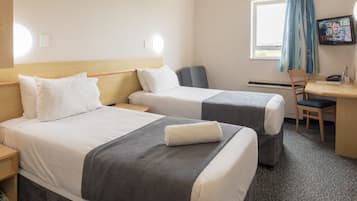 Desk, blackout curtains, free cots/infant beds, free WiFi
