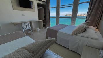 Comfort Triple Room, Beach View | Minibar, blackout curtains, free cots/infant beds, free WiFi