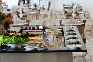 Breakfast, lunch, dinner served; beach views