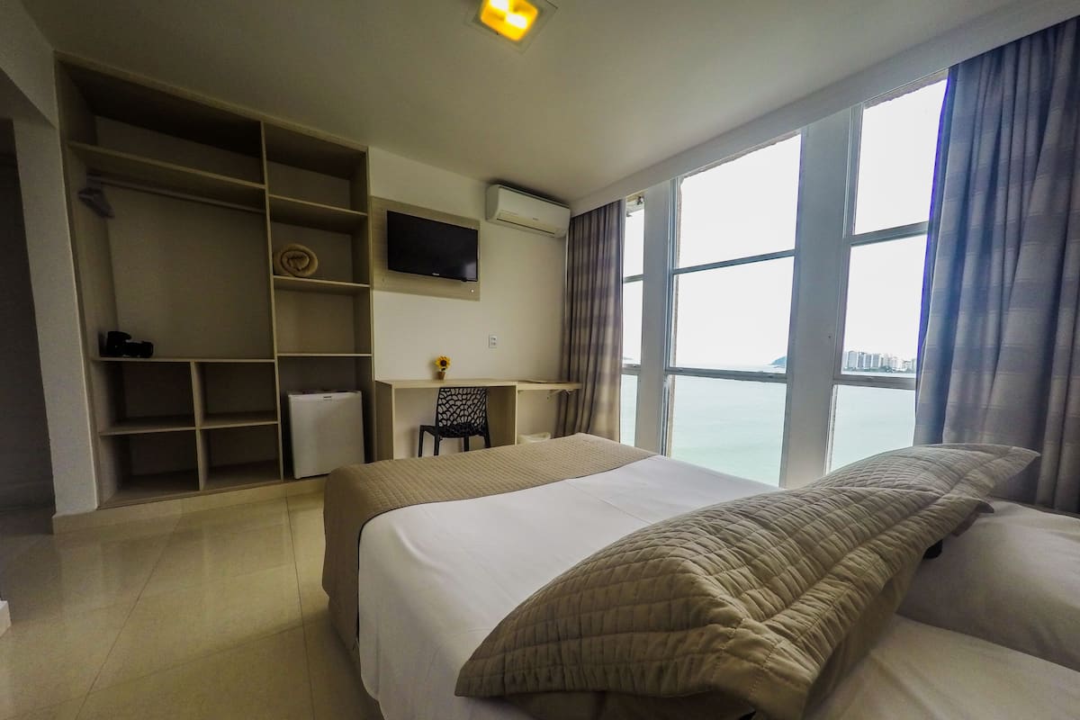 Doppia Comfort, vista spiaggia | Minibar, tende oscuranti, Wi-Fi gratuito, lenzuola