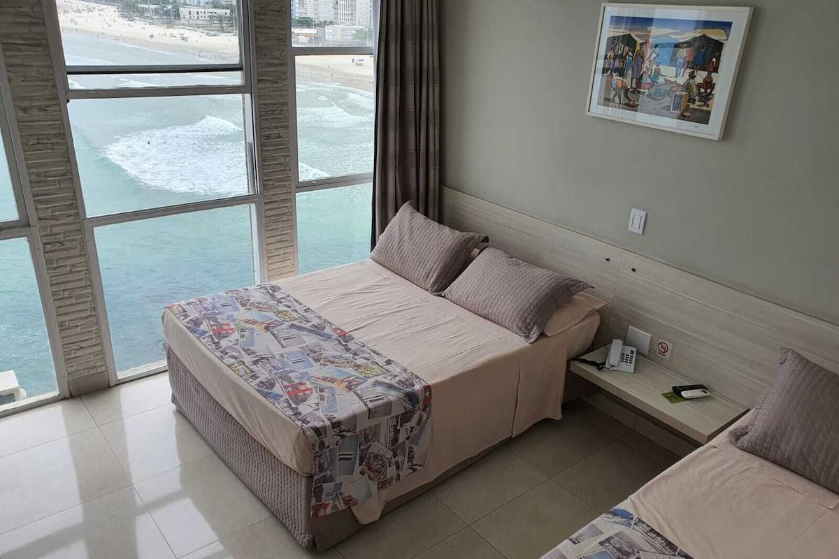 Tripla Comfort, vista spiaggia | Minibar, tende oscuranti, Wi-Fi gratuito, lenzuola