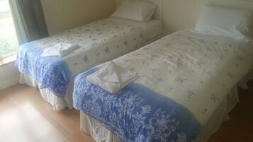 Basic Room, 4 Bedrooms, Shared Bathroom | Desk, laptop workspace, free WiFi, bed sheets