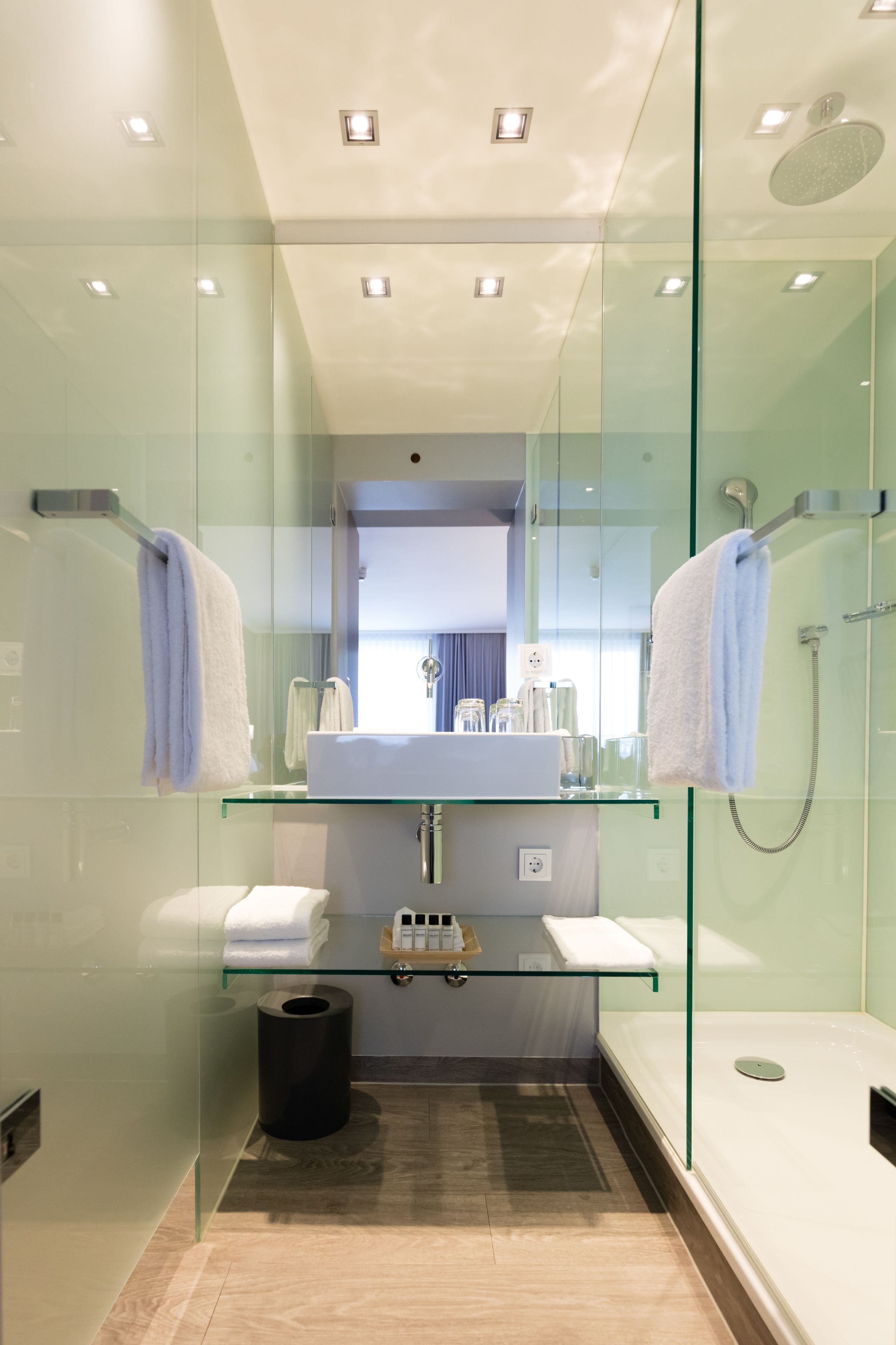 superior double room | bathroom | shower, rainfall showerhead, free toiletries, hair dryer