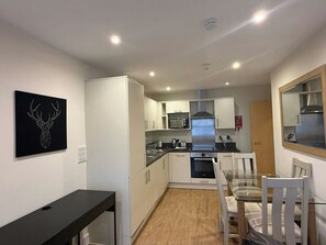 Desk, iron/ironing board, cribs/infant beds, rollaway beds
