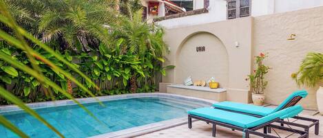 Outdoor pool, pool umbrellas, pool loungers