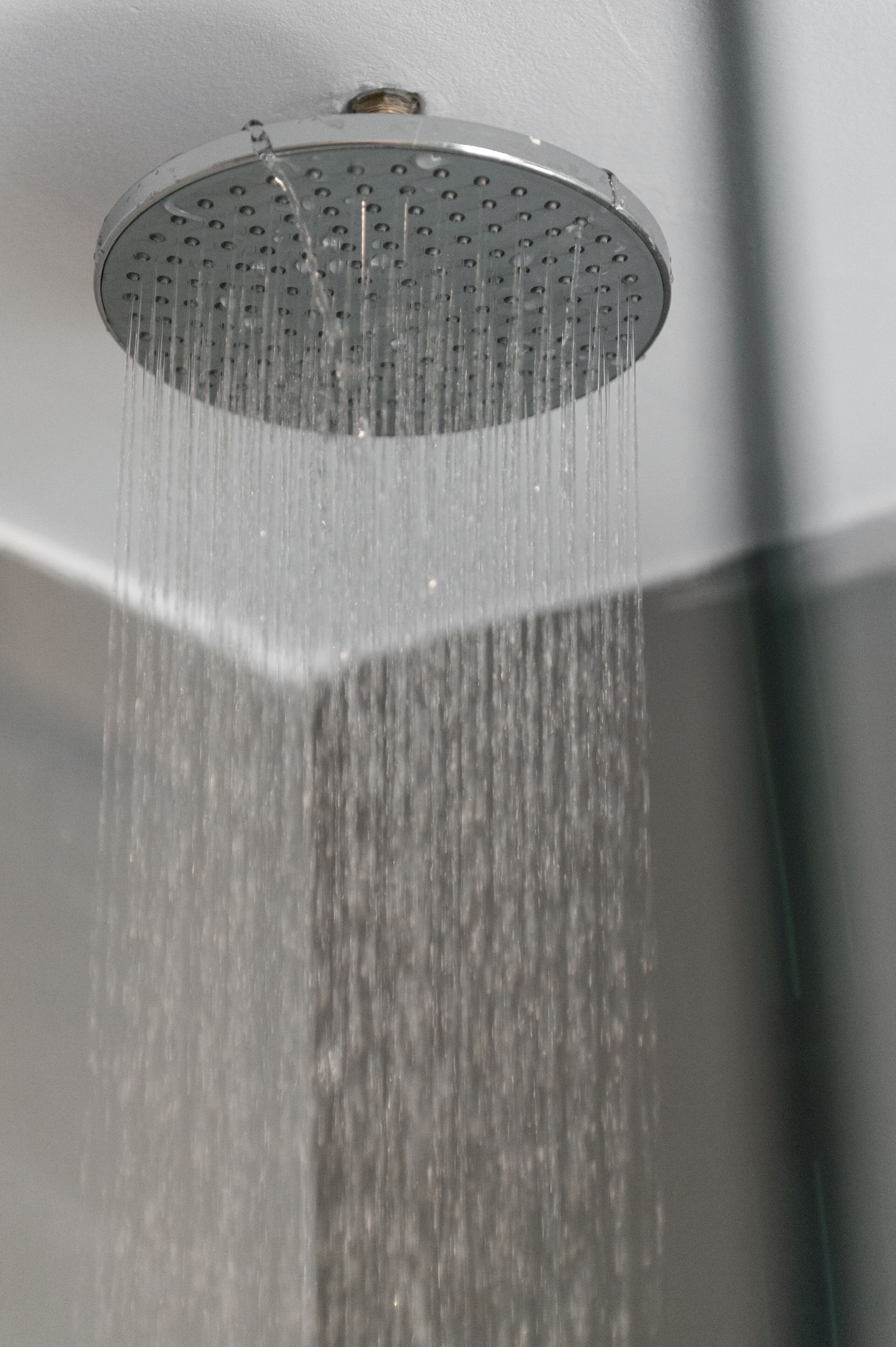 deluxe triple room | bathroom | shower, free toiletries, towels