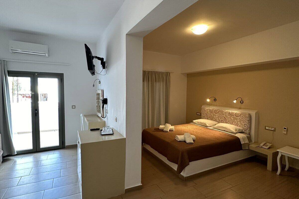 double room, pool view | in-room safe, blackout curtains, soundproofing, iron/ironing board