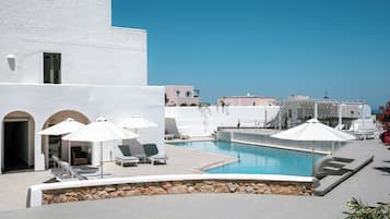 Outdoor pool, pool umbrellas, pool loungers