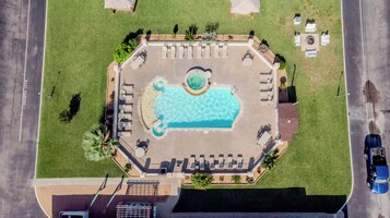 Outdoor pool, open 9 AM to 11:00 PM, sun loungers