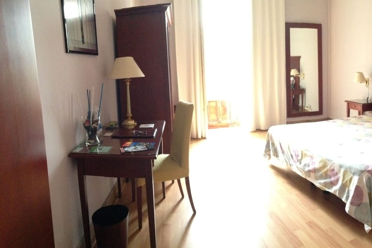 Standard Double Room (with private external bathroom) | Minibar, in-room safe, desk, blackout drapes