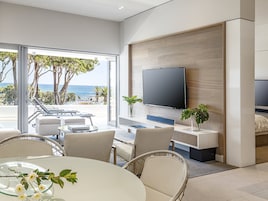 One Bed Luxury Suite | Living area | 55-inch Smart TV with digital channels, TV