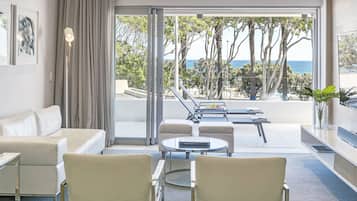 One Bed Luxury Suite | Living area | 55-inch Smart TV with digital channels, TV
