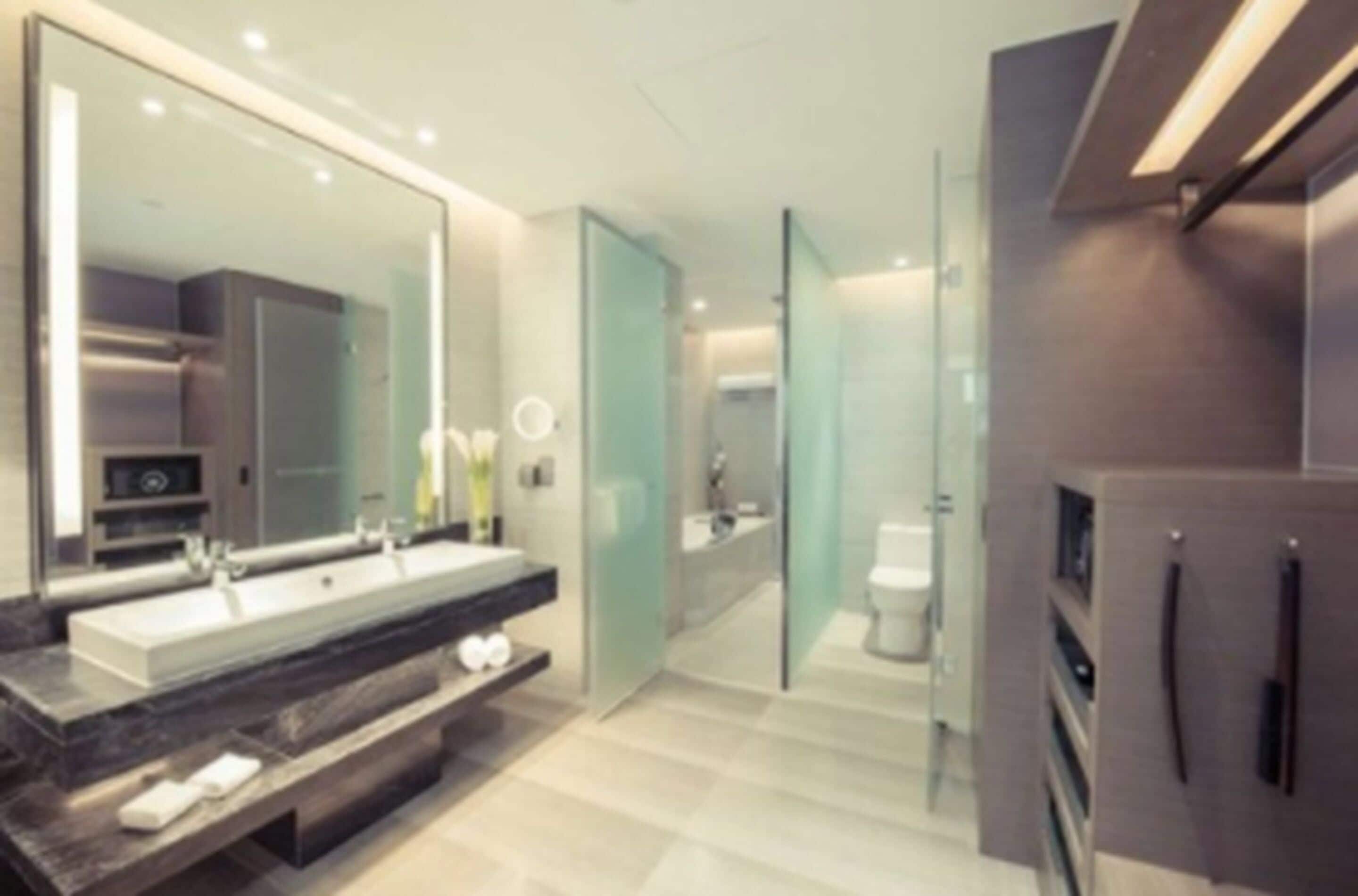 separate bathtub and shower, rainfall showerhead, designer toiletries