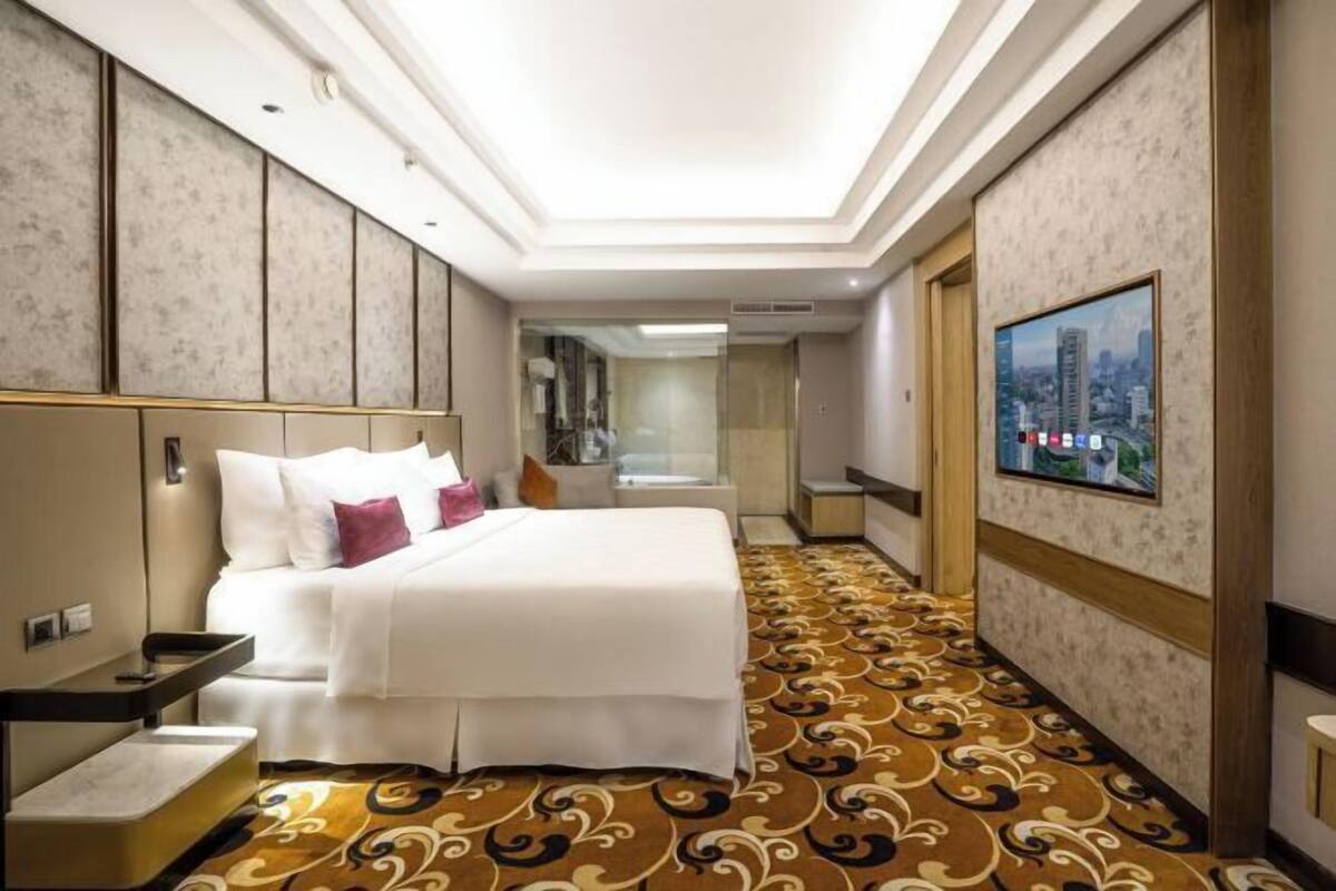 Ropa de cama de alta calidad, minibar, caja fuerte y escritorio