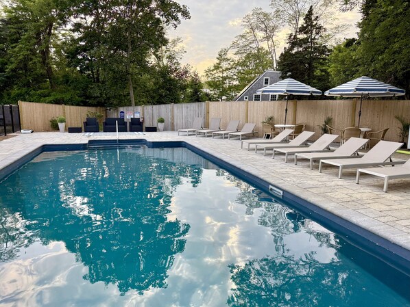 Seasonal outdoor pool, pool umbrellas, pool loungers