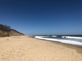 Sun loungers, beach umbrellas, beach towels