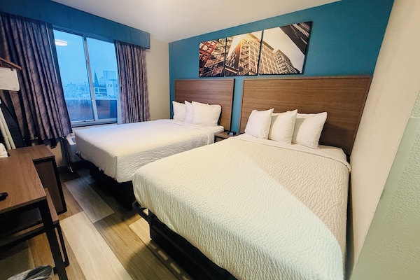 Room, 2 Double Beds, Non Smoking | 1 bedroom, in-room safe, desk, blackout drapes