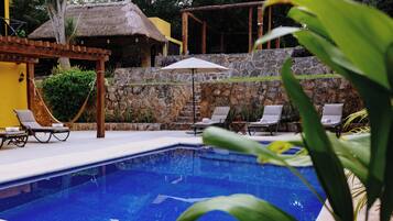 Outdoor pool, open 8:00 AM to 8:00 PM, pool umbrellas