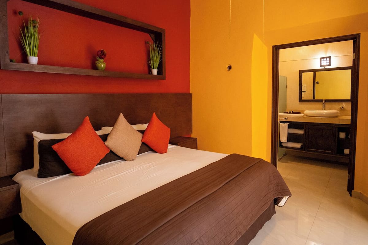 Premium Room, 1 King Bed | Individually furnished, iron/ironing board, free WiFi, bed sheets