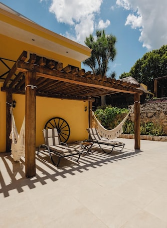 Outdoor pool, open 8:00 AM to 8:00 PM, pool umbrellas. Hotel Rinconada del Convento