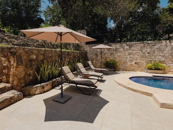 Outdoor pool, open 8:00 AM to 8:00 PM, pool umbrellas
