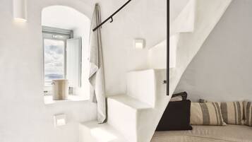 Deluxe Suite, Jetted Tub, Sea View (Windmill) | Living area | 24-inch flat-screen TV with satellite channels, TV, iPod dock
