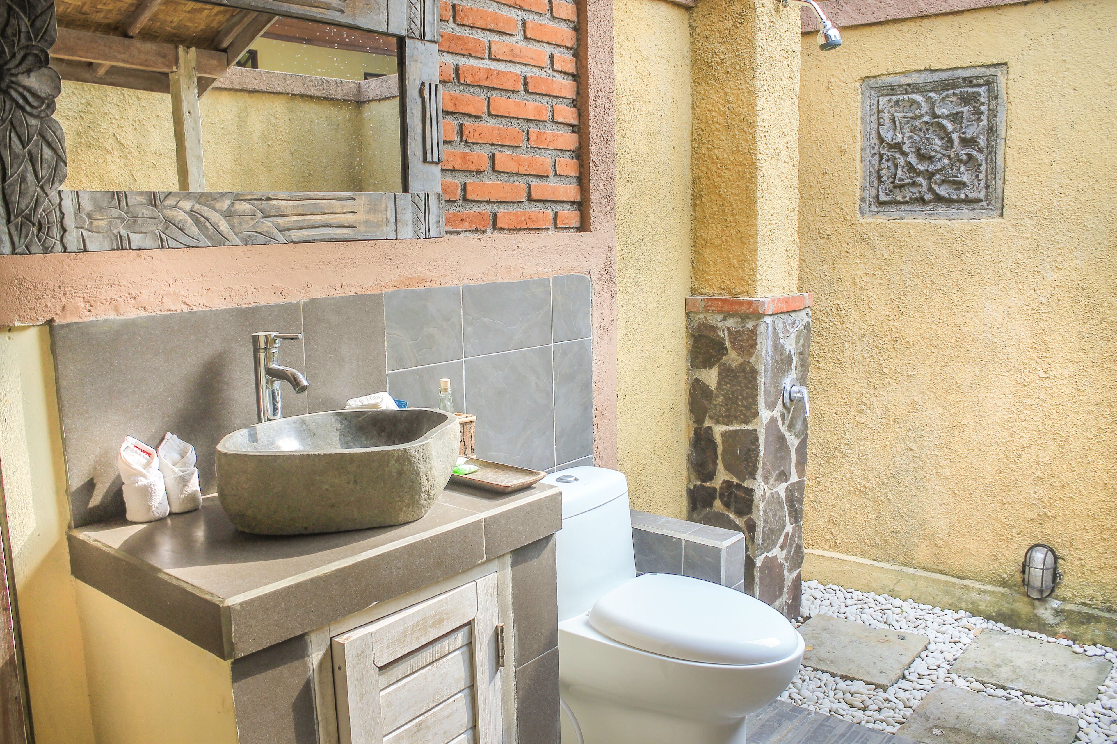 joglo villa | bathroom | shower, rainfall showerhead, hair dryer, soap