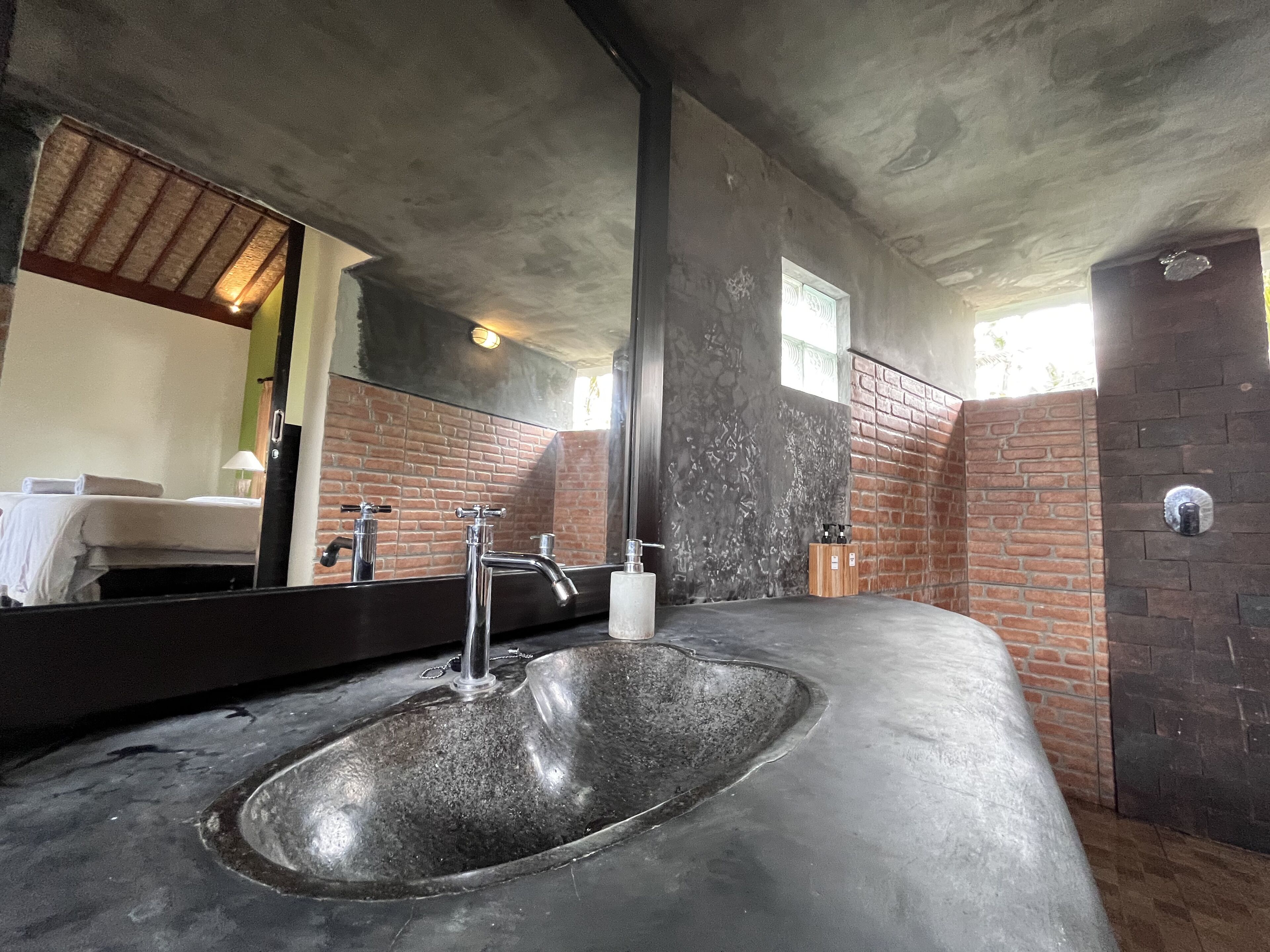 riverside room | bathroom | shower, rainfall showerhead, hair dryer, soap