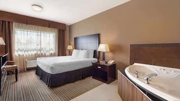 Chambre Standard, 1 très grand lit, non-fumeurs, baignoire à jets | Literie de qualité supérieure, surmatelas, bureau