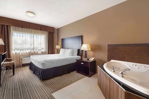 Habitación estándar, 1 cama de matrimonio grande, no fumadores, bañera de hidromasaje | Ropa de cama de alta calidad y colchones con acolchado adicional
