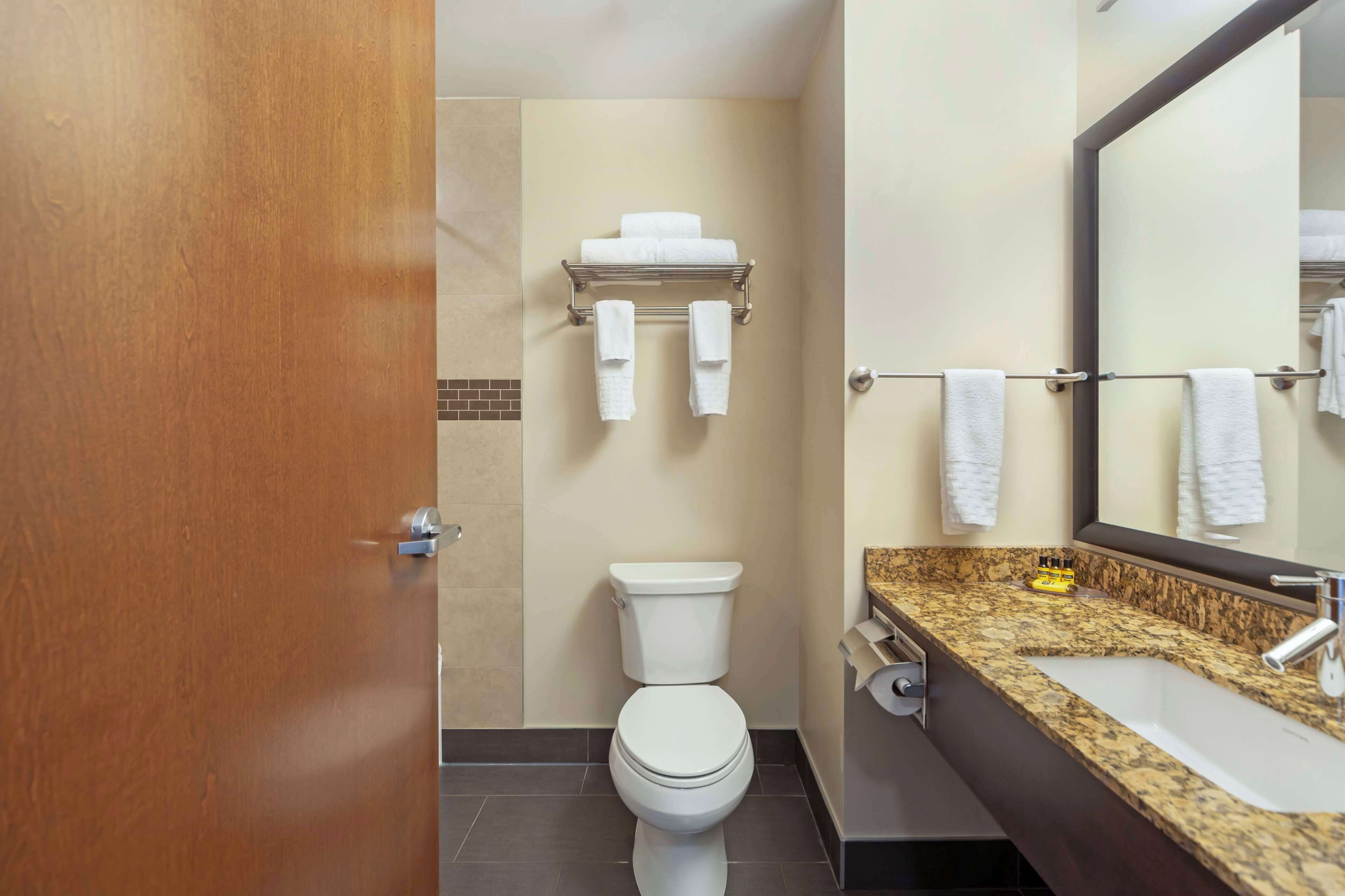 standard room, 2 queen beds, non smoking, kitchenette (larger room) | bathroom | combined shower/bathtub, deep-soaking bathtub, free toiletries