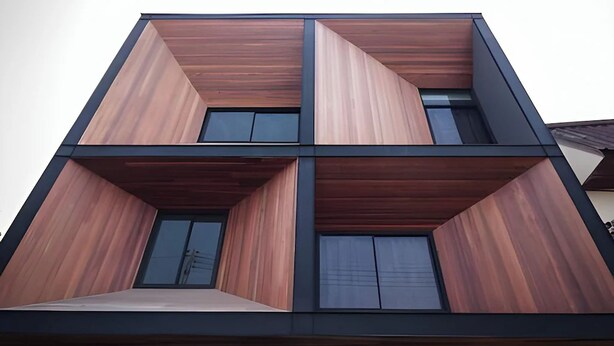 A modern multi-story building with a symmetrical facade, large windows, and a flat roof. - HeyHa House ChiangMai (Chiang Mai)