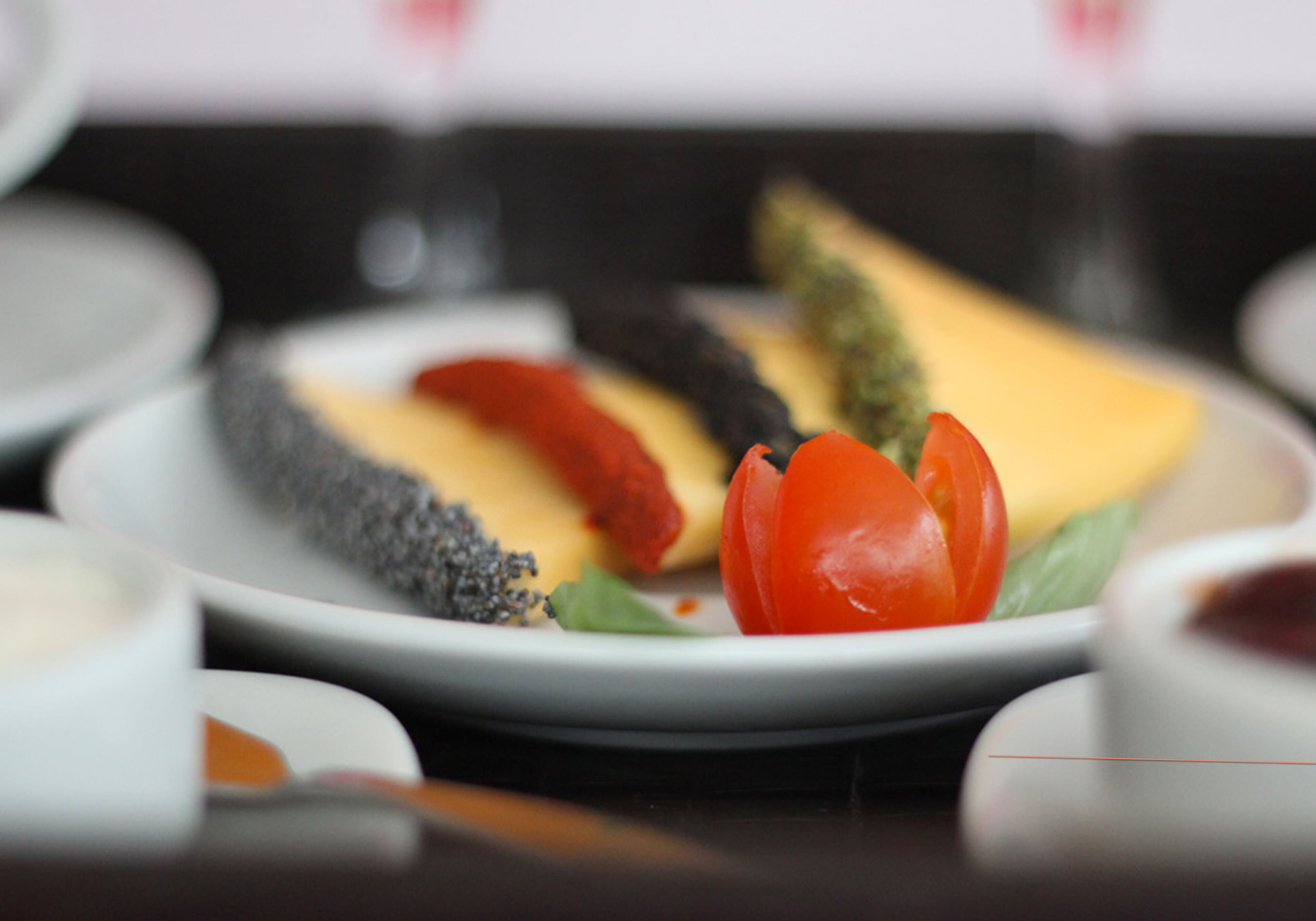 A plate with various vegetables and cheese.